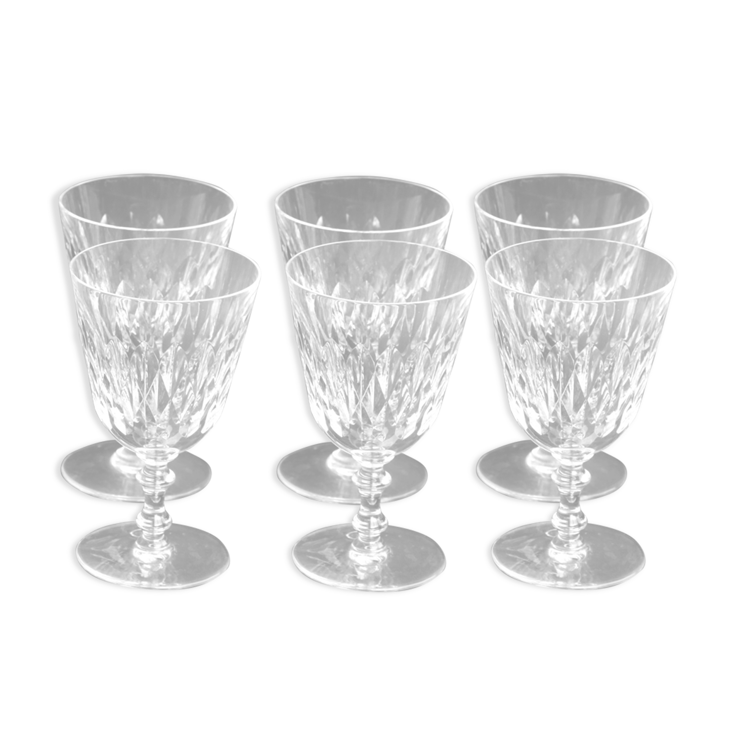Suite of 6 Baccarat crystal water glasses with honeycomb patterns.