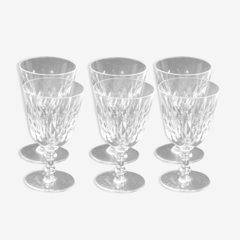 Suite of 6 Baccarat crystal water glasses with honeycomb patterns.
