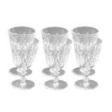 Suite of 6 Baccarat crystal water glasses with honeycomb patterns.