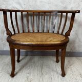 Caned armchair