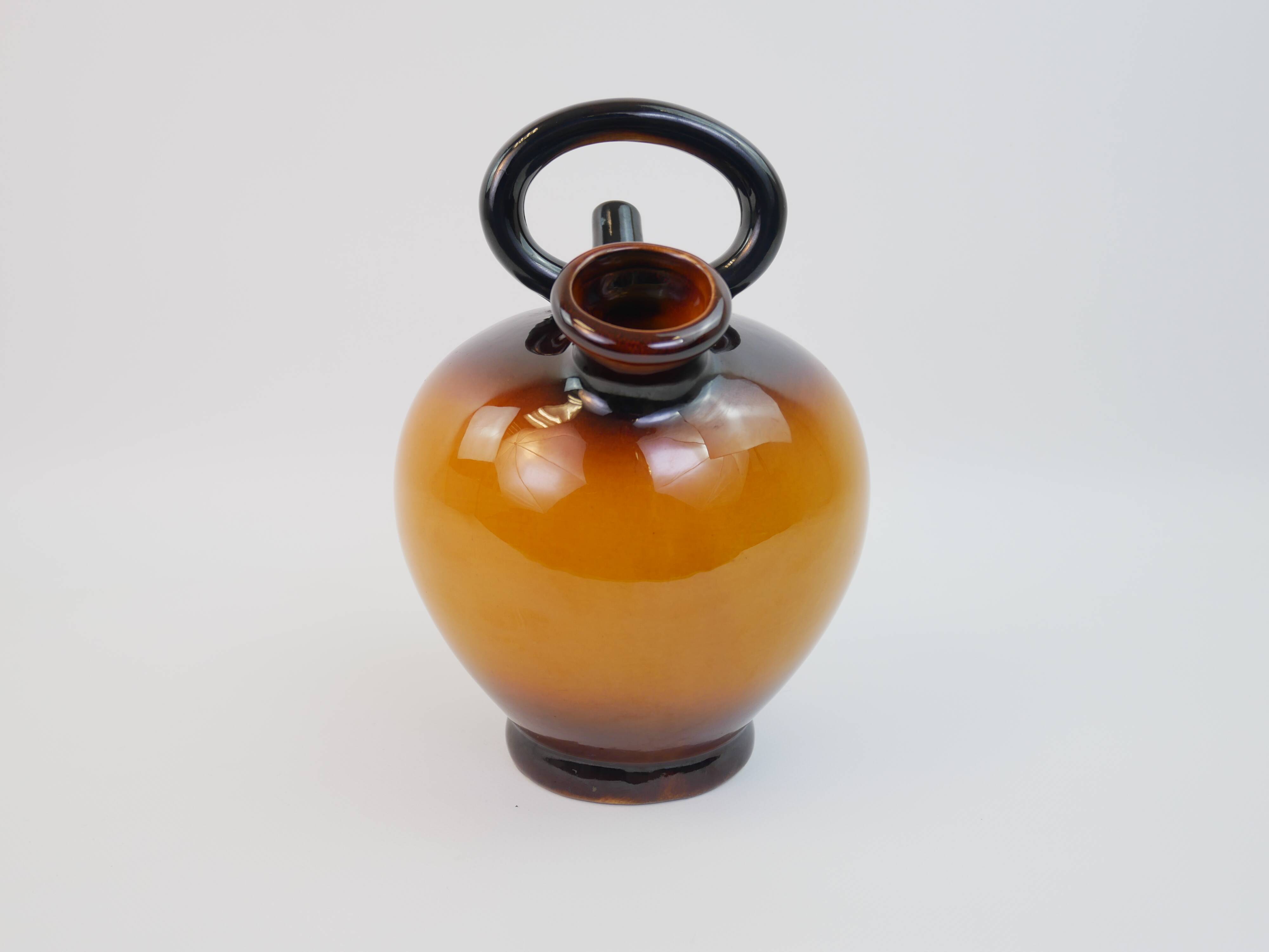 Ochre-orange ceramic jug signed under the base CP Claude Paci