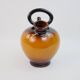 Ochre-orange ceramic jug signed under the base CP Claude Paci
