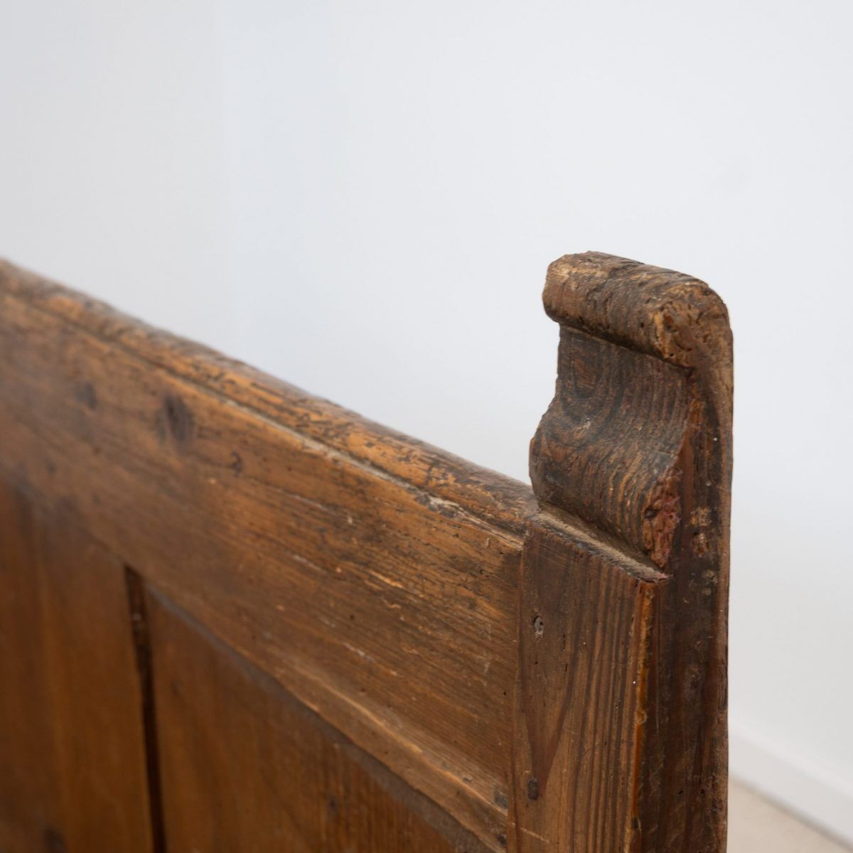 Old wooden bench with panelled backrest – 19th century
