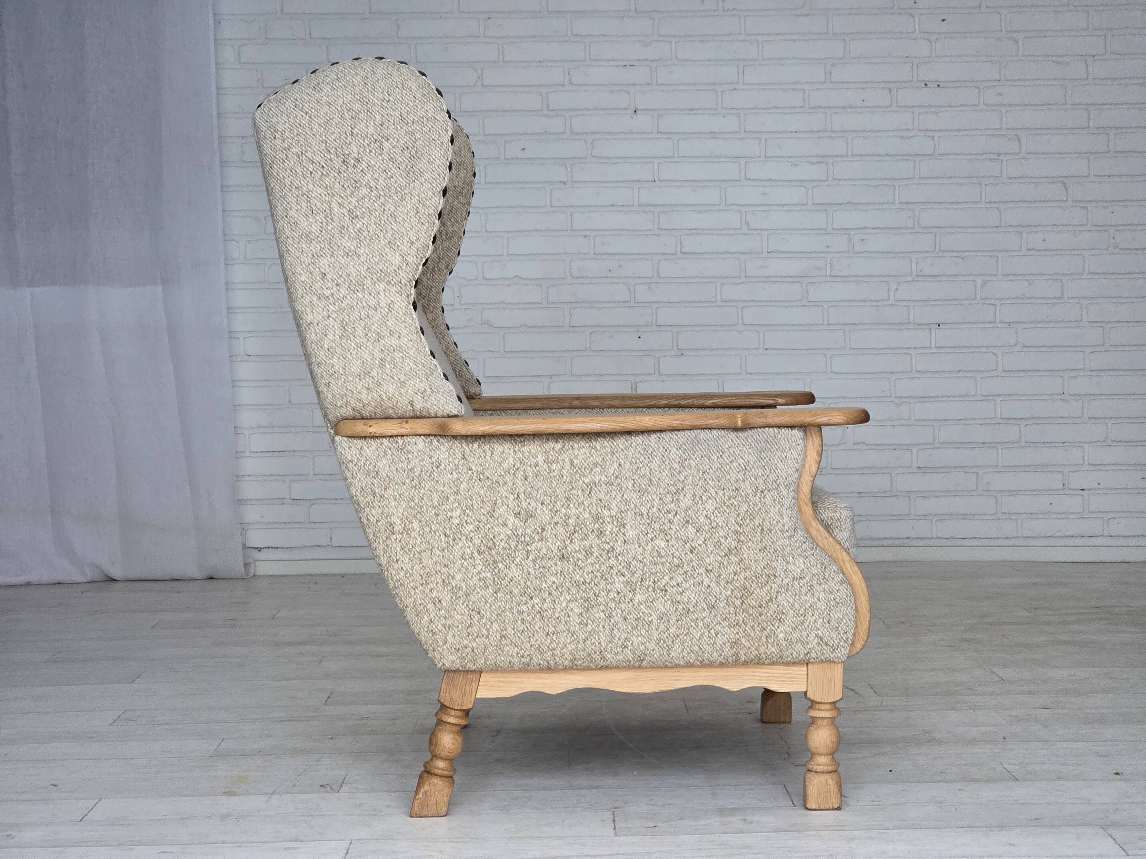 1970s, Danish highback armchair, furniture wool, solid oak wood.