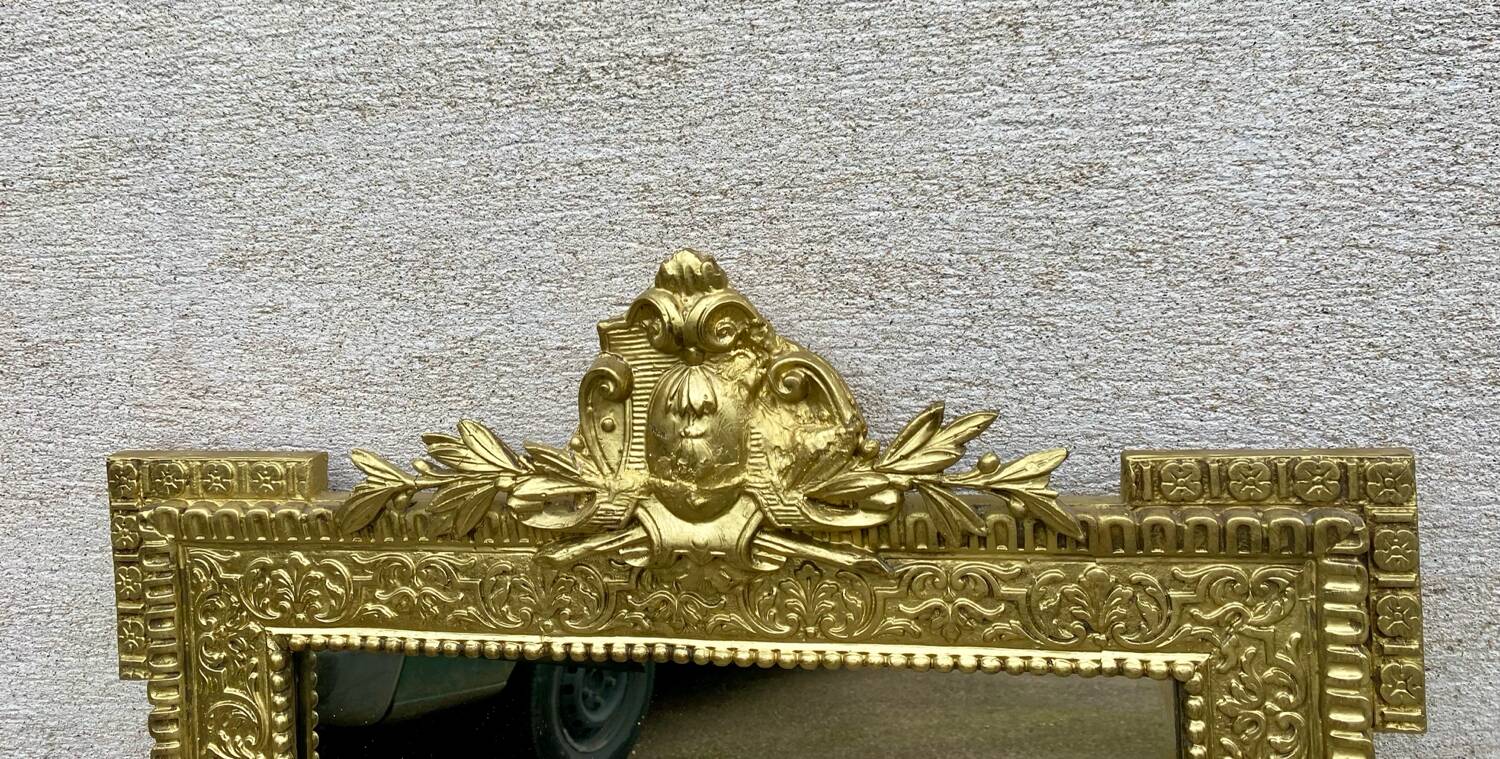 Two antique 19th century mirrors in carved Napoleon oak wood