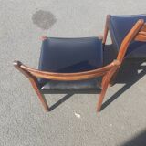 Scandinavian chairs in teak and black skaï.