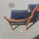 Scandinavian chairs in teak and black skaï.
