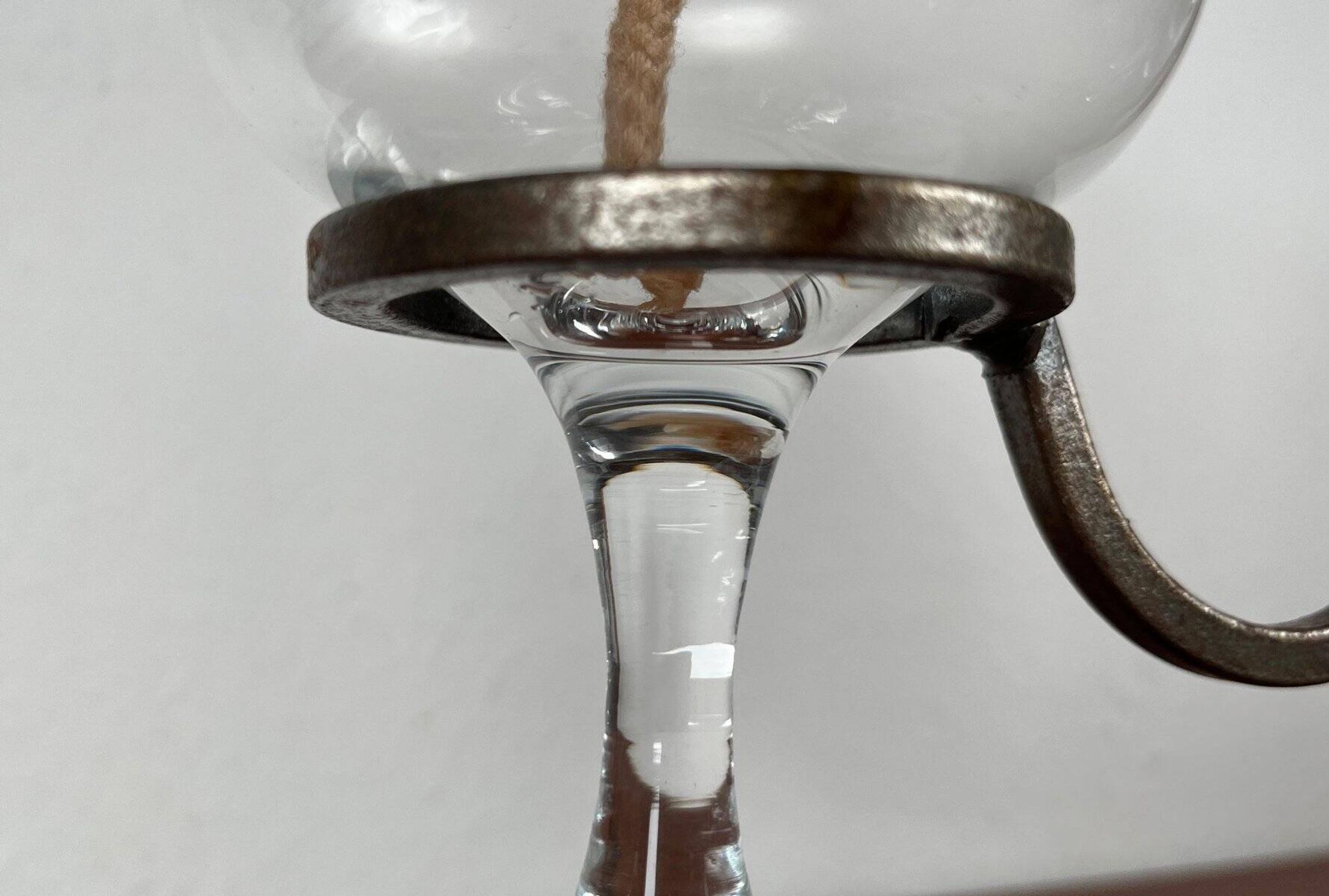 Mid-century Danish wrought iron and glass table oil lamp, 1960s.