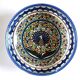 Large decorative dish with colorful peacock