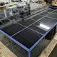 Black tiled coffee table and midnight blue grout