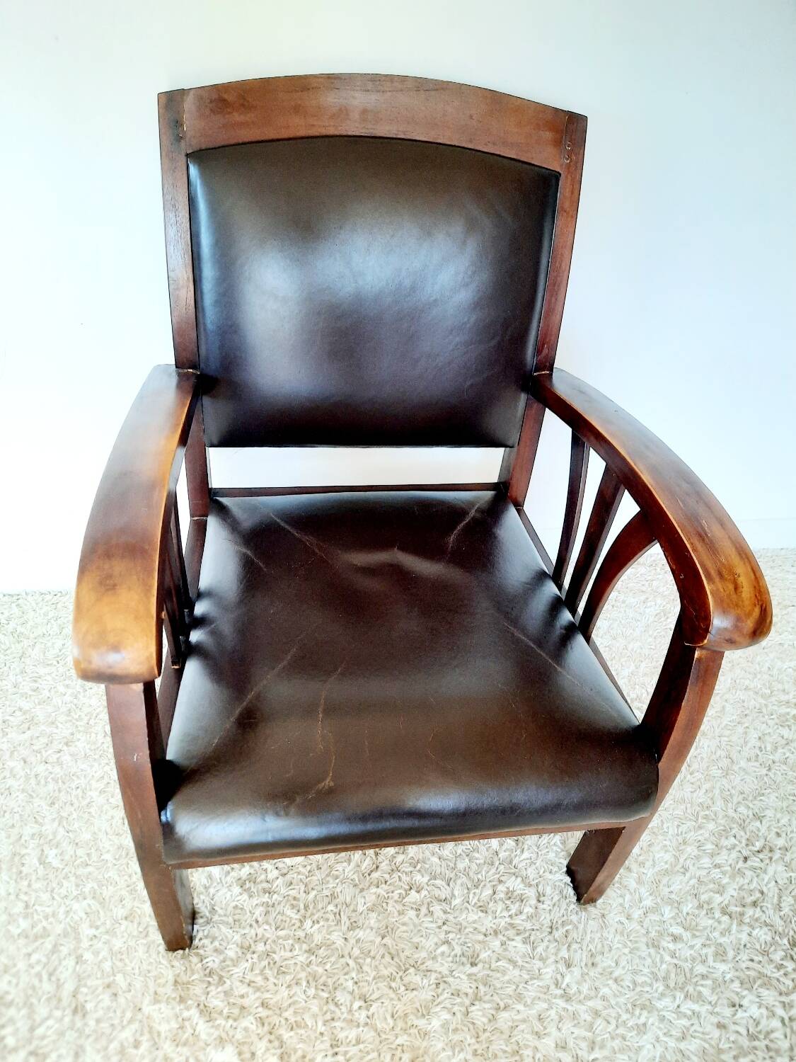 Colonial style wooden armchair