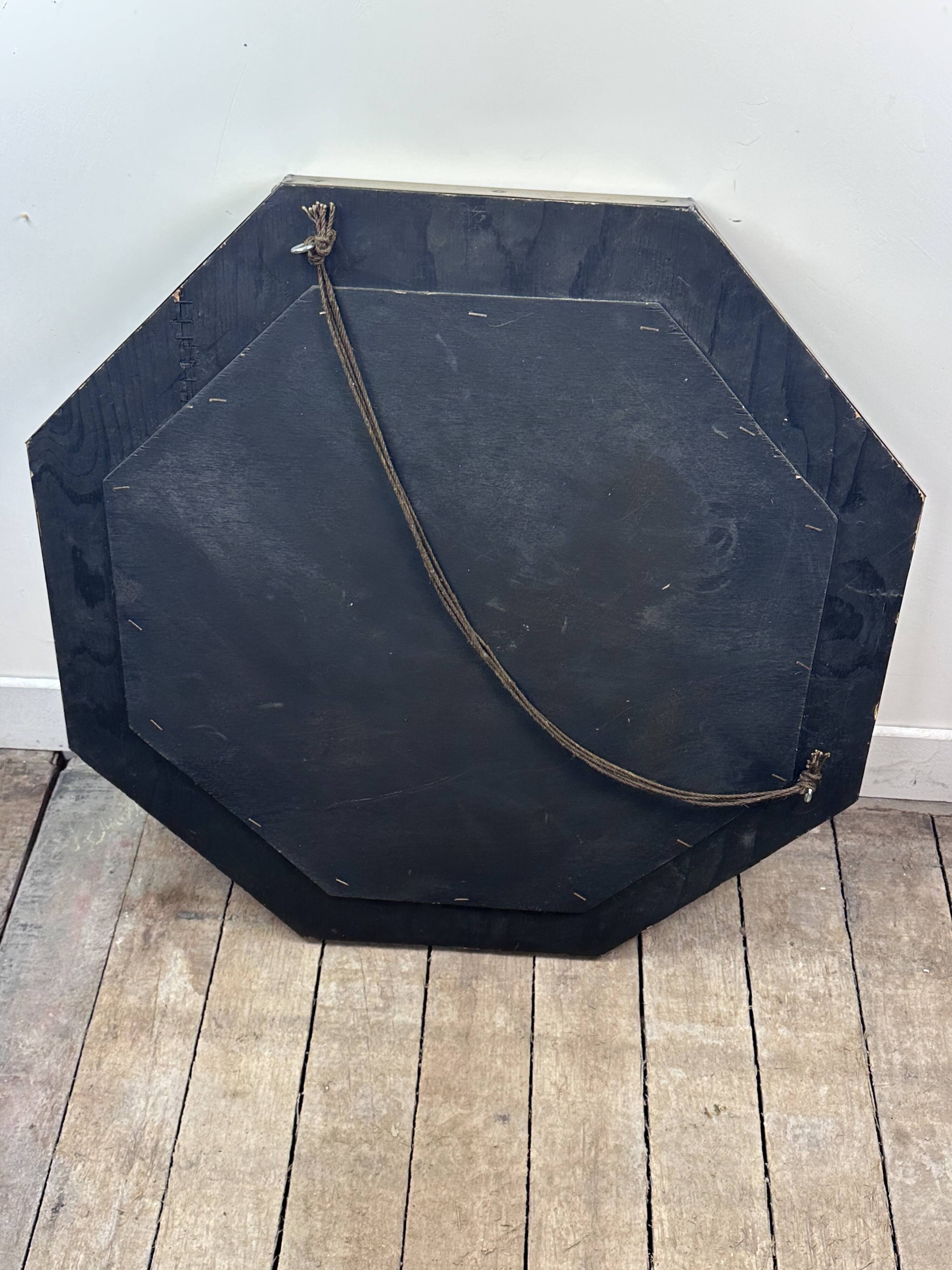 Vintage 1960s octagonal brass and pewter mirror