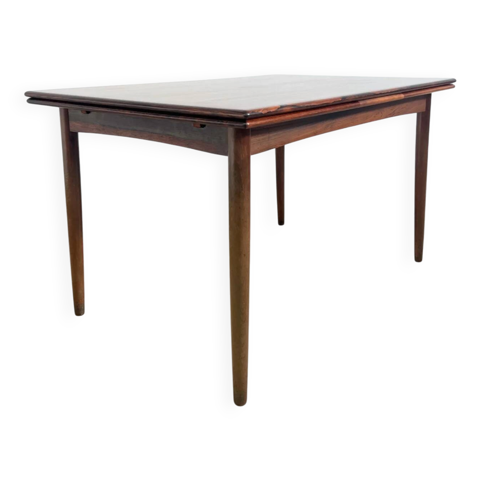 Rosewood dining table with integrated extensions — Denmark, 1960s