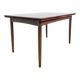 Rosewood dining table with integrated extensions — Denmark, 1960s