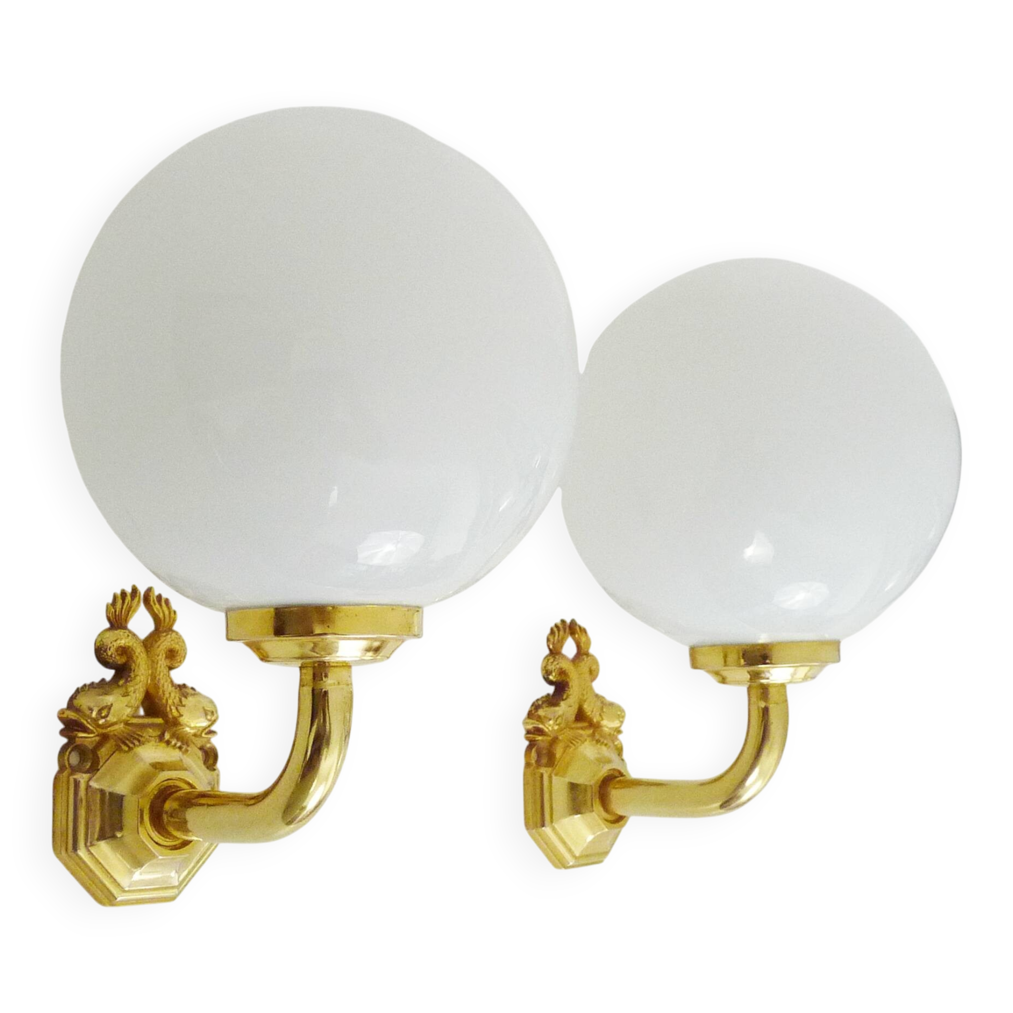 Pair of wall sconces with carp fish, brass and opaline globe.