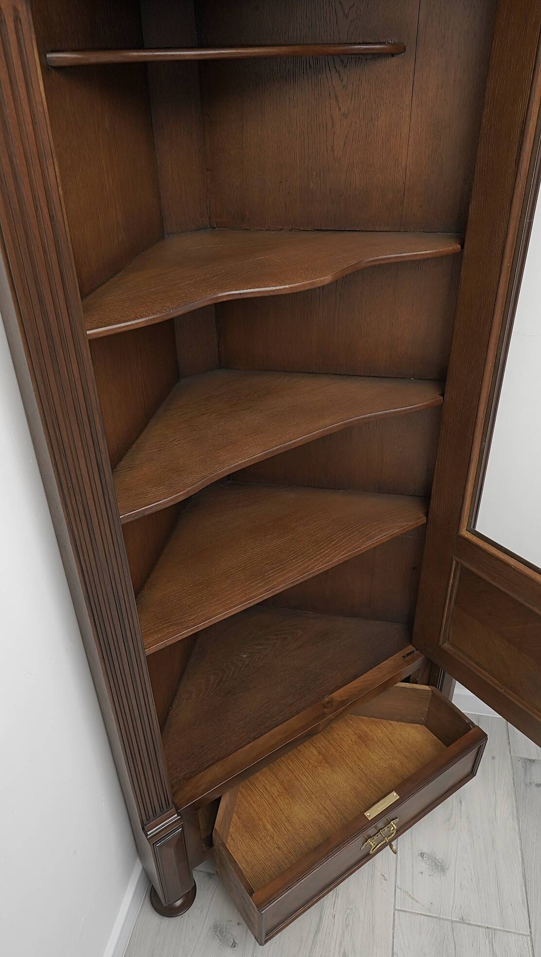 Antique French corner bookcase. After professional renovation.