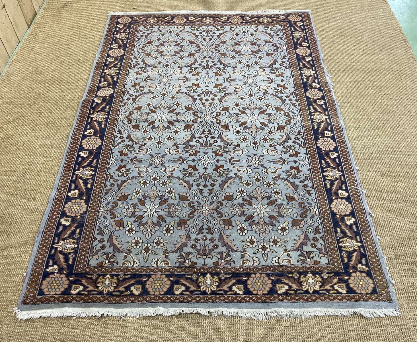 Handmade wool oriental carpet (wear defects)