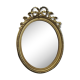 Miroir ovale en bois doré de style Louis XVI 48 X 67cm