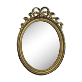 Louis XVI-style gilded wooden oval mirror