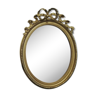 Louis XVI-style gilded wooden oval mirror