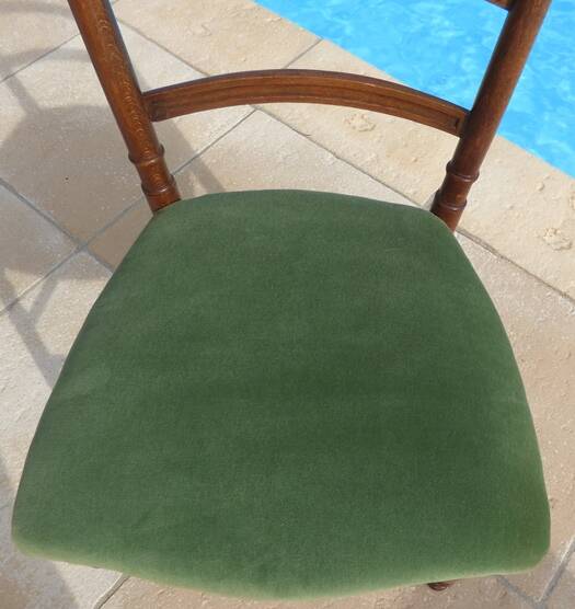1 solid wood chair with green velvet top and nails