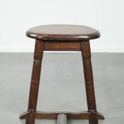 Antique Dutch oak stool from the early 19th century with a nice design