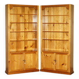 Pair of vintage cherry wood bookcases with lockable doors.