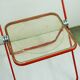 Red Plia Lucite folding chair by G. Piretti for Castelli Italy