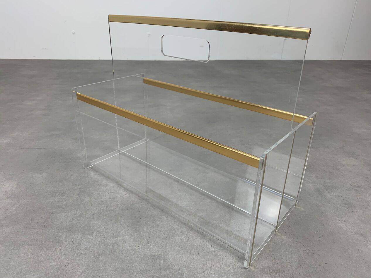 Plexiglass and brass magazine rack from the 70s in Hollywood Regency style.