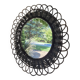 Vintage black rattan flower mirror