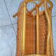 Vintage woven rattan magazine rack