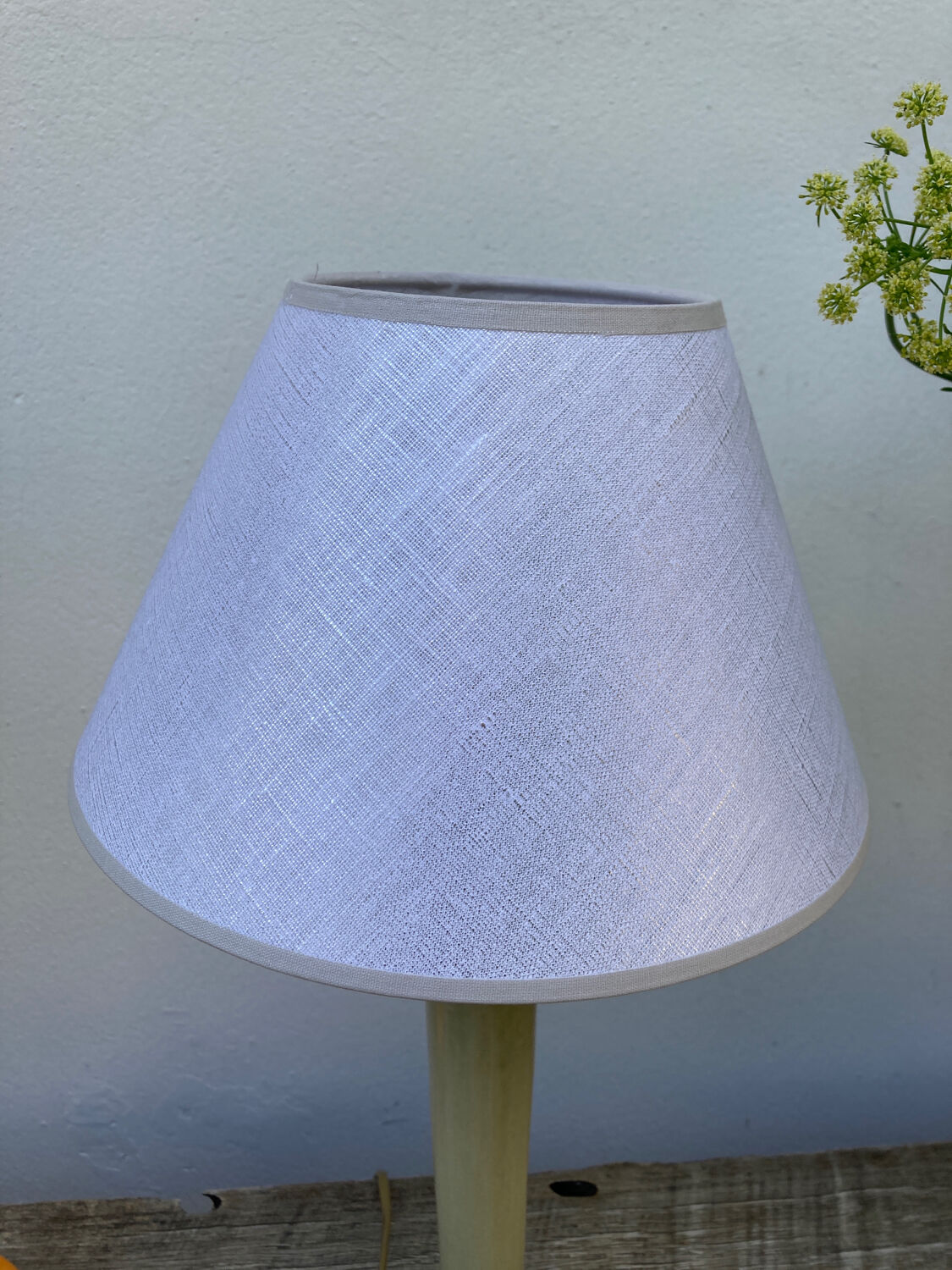 Beige ceramic lamp and iridescent white lampshade