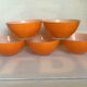 Five old orange duralex bowls