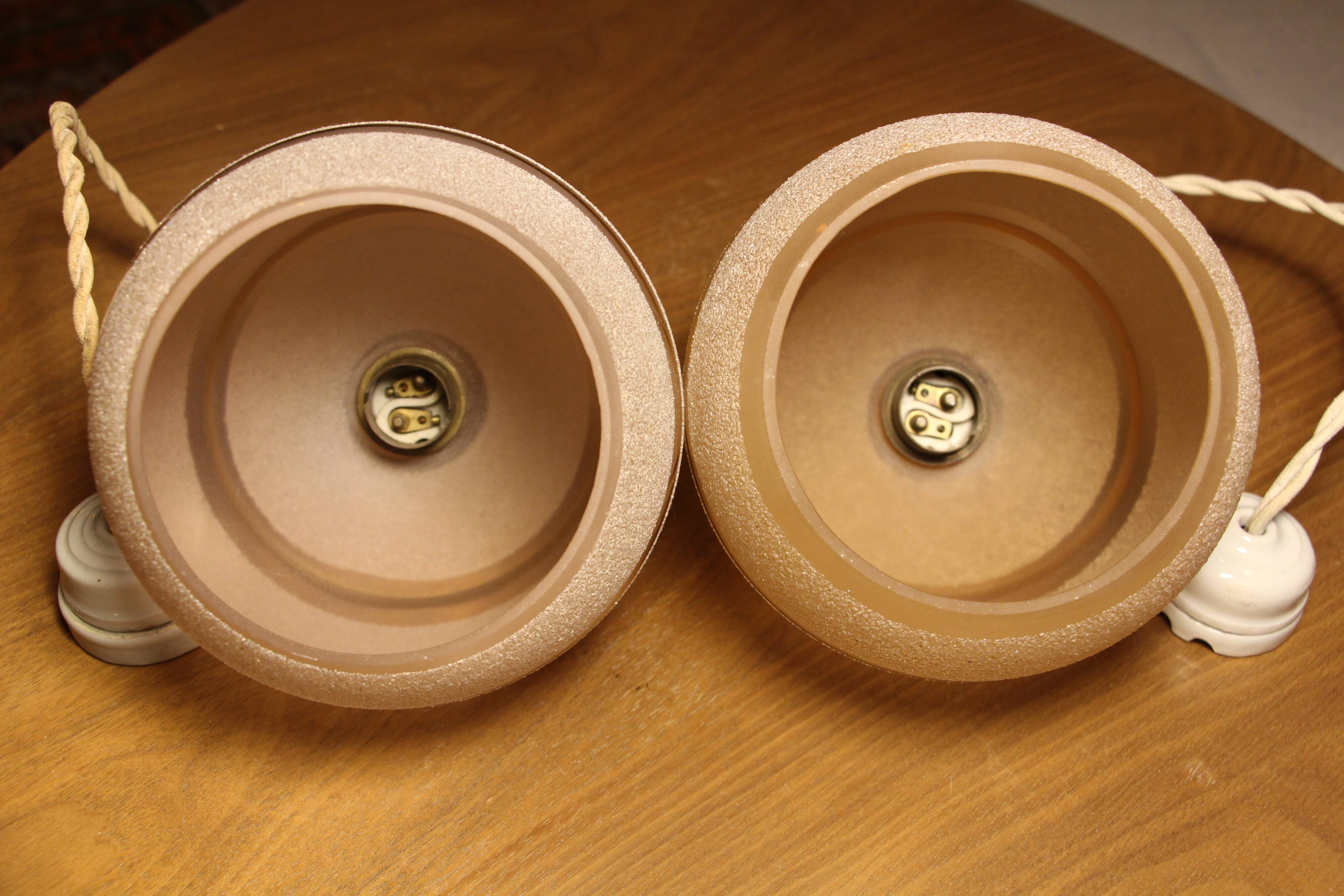 Set of two Art Deco pendant lamps in pink and gold glass