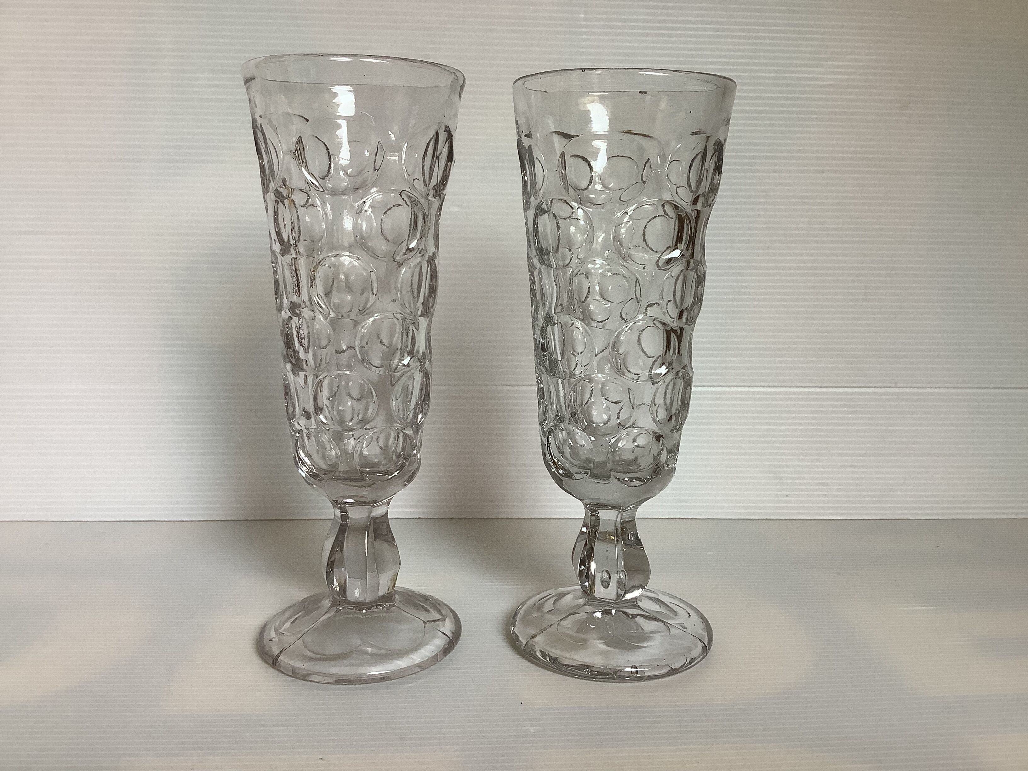 Pair of old glasses with absinthe molded glass