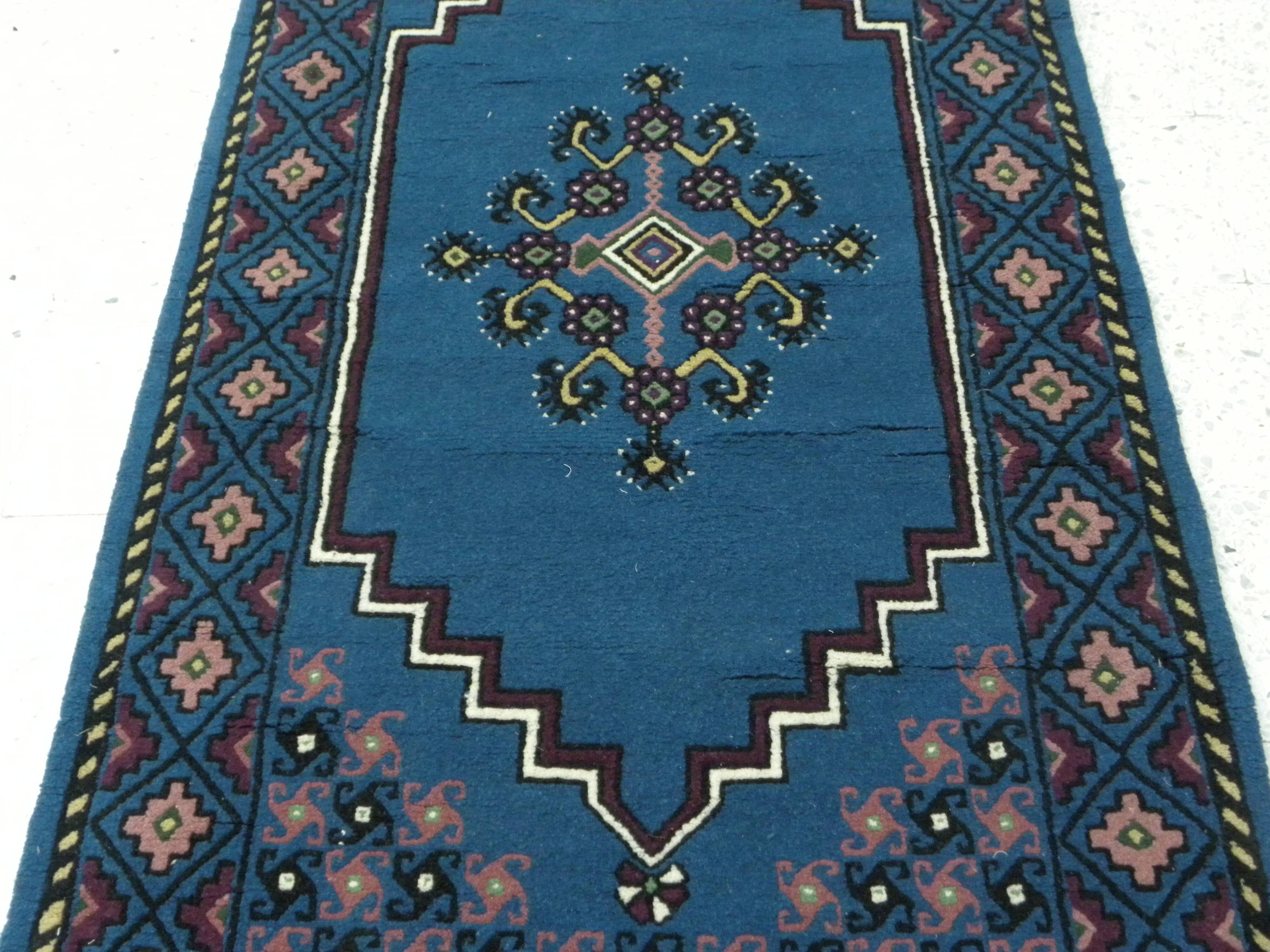 Vintage traditional Tunisian oriental rug in handmade blue wool.