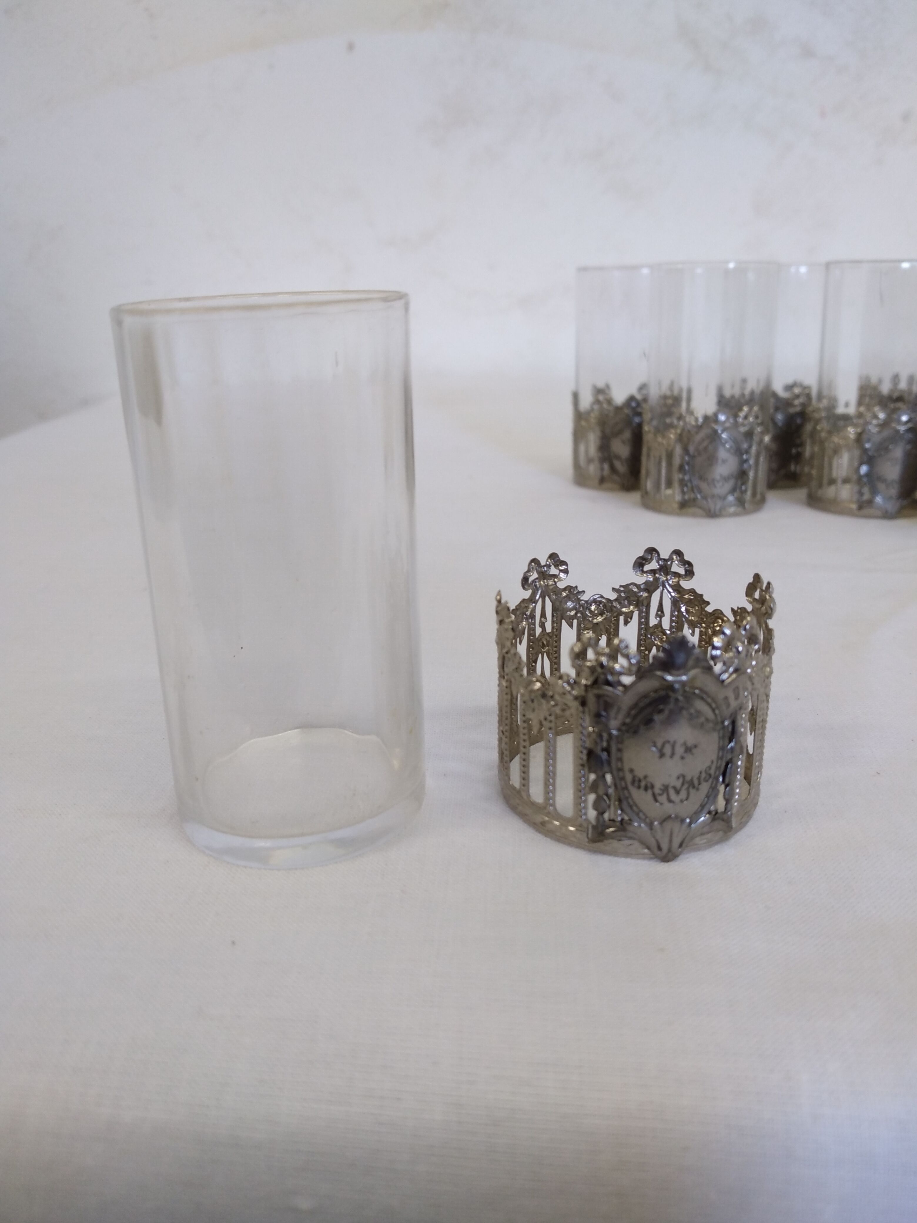 Glass with art deco strapping