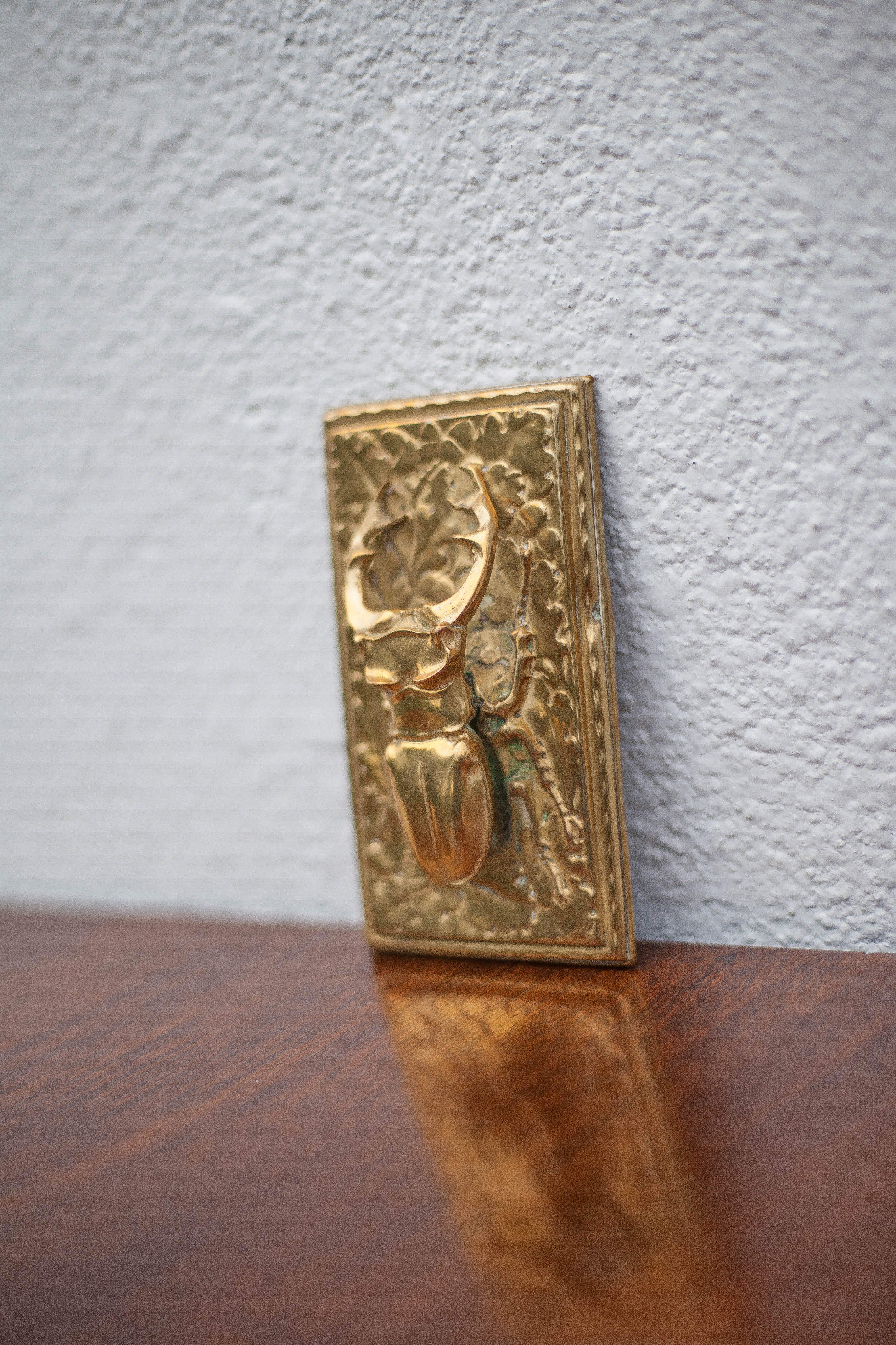 Scarab brass mail clip