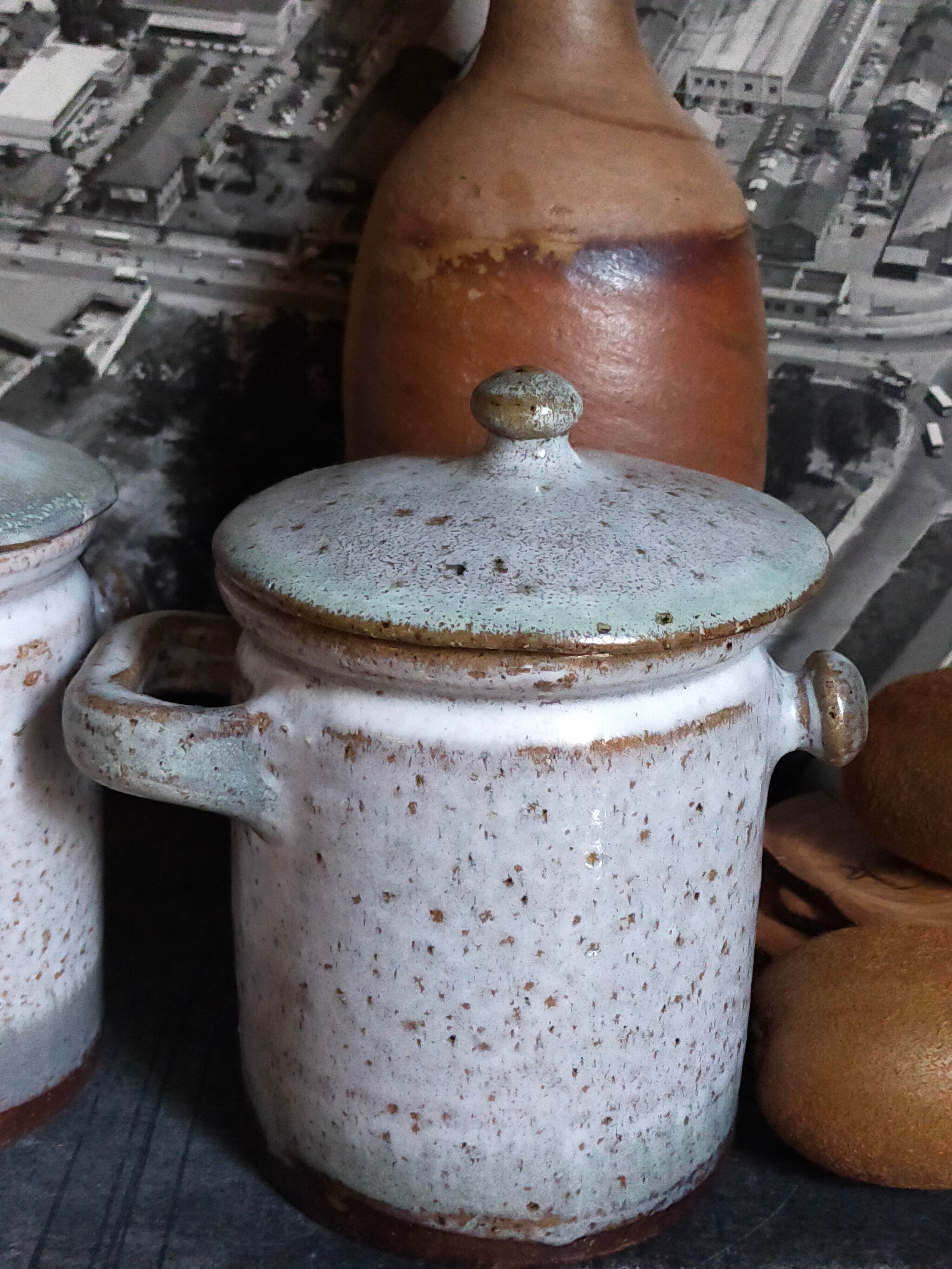 Duo of potter's pots covered in vintage glazed stoneware