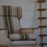 Pair of high-back lounge chairs in modern Danish style in the manner of Henning Kjærnulf, 1960s.