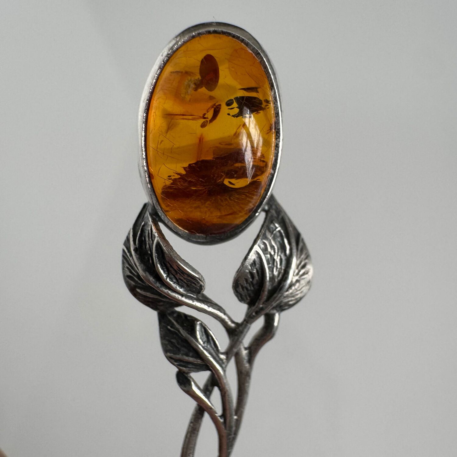 Silver spoon with amber