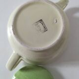 Two sugar bowls and a textured plate in turquoise and green Salins earthenware.