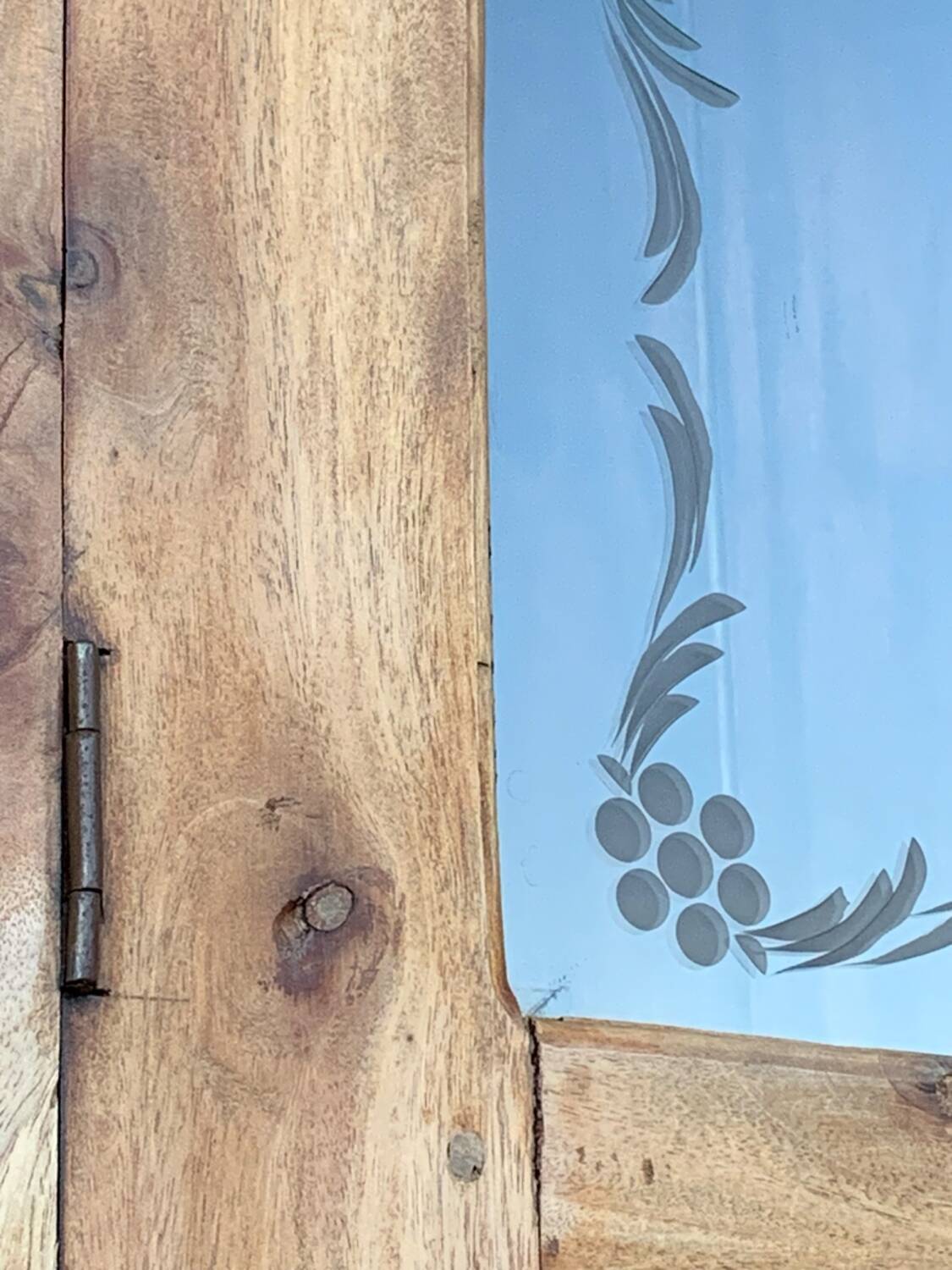 Parisian wardrobe in raw wood with engraved glass from 1920.