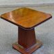 Art Deco dining table in rosewood from the 1950s with a central leg.