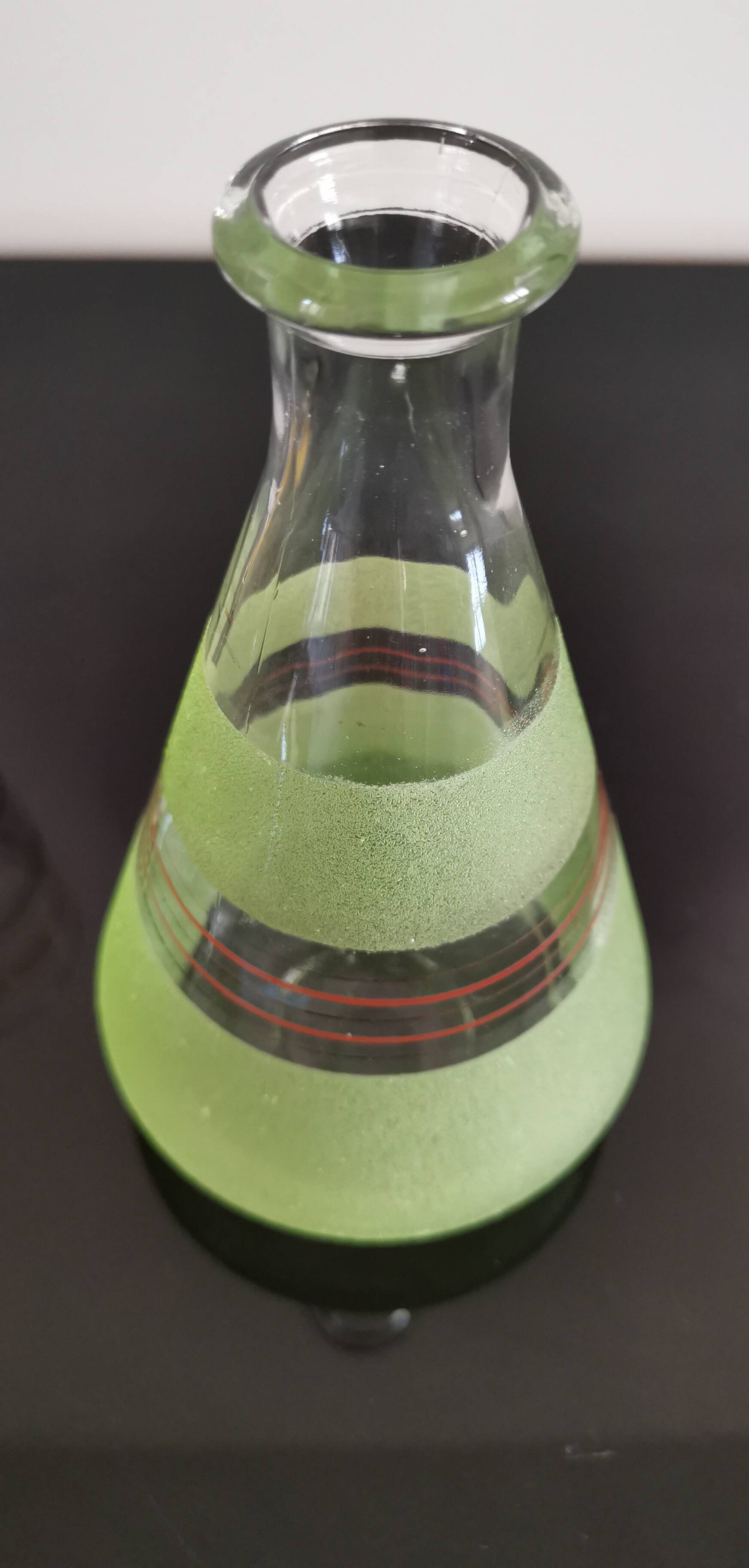 Set of 4 colored granite glasses with its carafe
