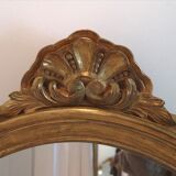 Oval baroque gold mirror