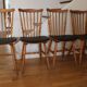 4 BAUMANN Tacoma chairs in black imitation leather and light beech