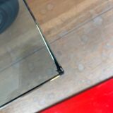 Gae Aulenti coffee table for Fontana Arte, transparent glass top with black cast iron supports, 1980s.