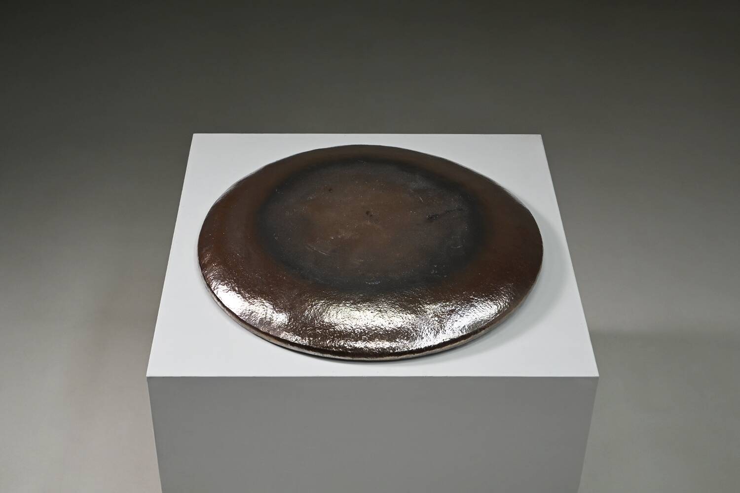 Large handmade metallic glazed ceramic bowl, circa 1980s–1990s.