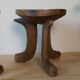 Pair of ancient Ethiopian tripod stools made of monoxyle wood.